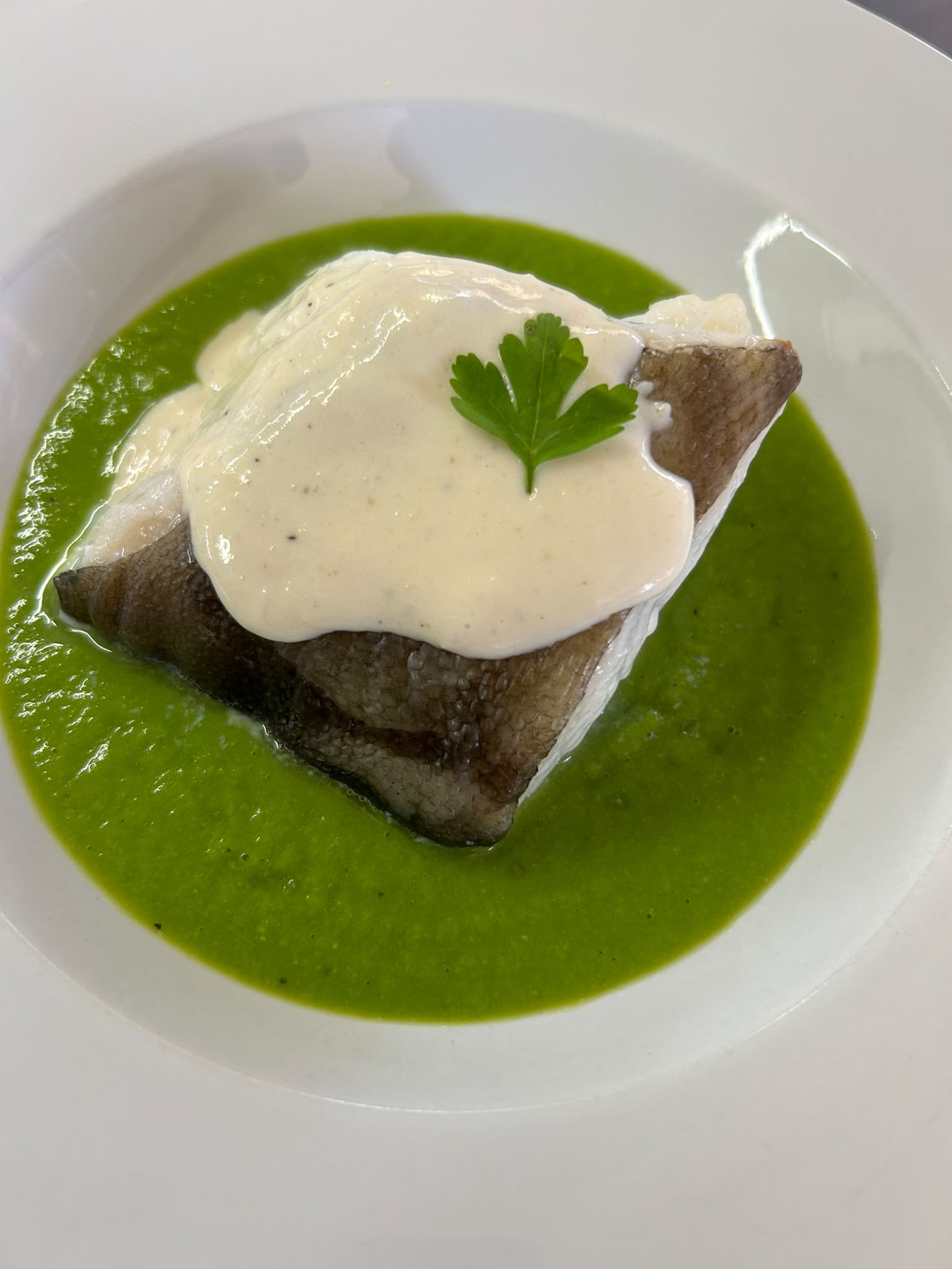 Bacallà amb salsa cremosa de carxofes i foie a Can Flautes