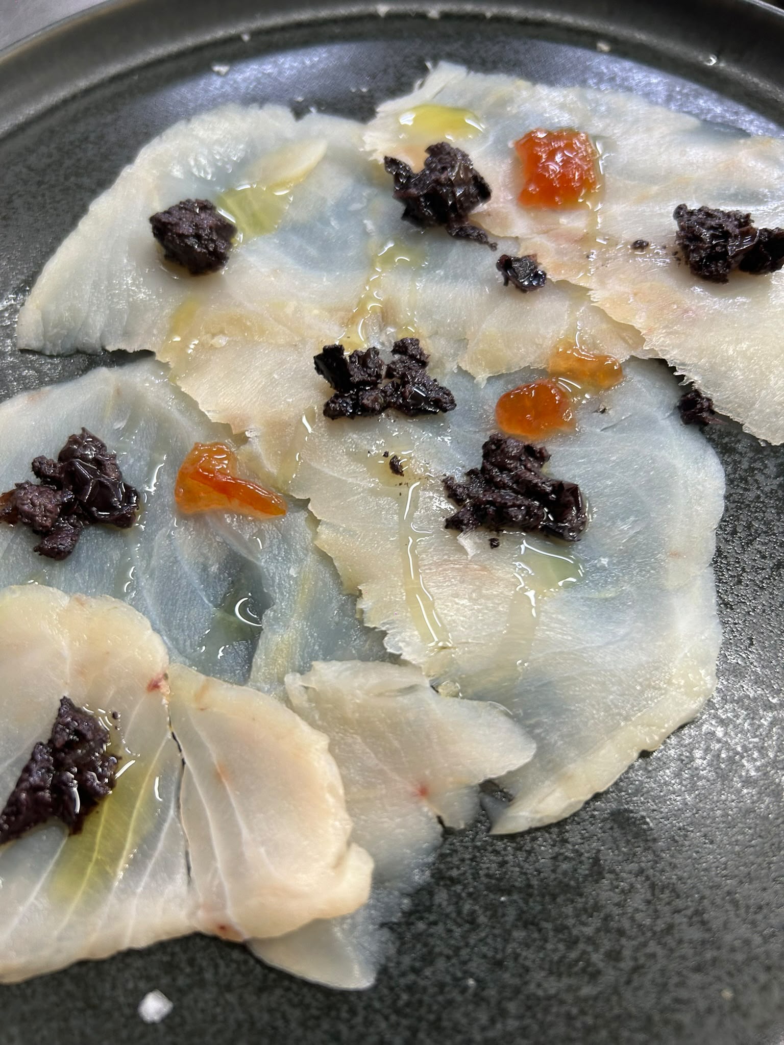 Carpaccio de peix fresc al restaurant Can Flautes
